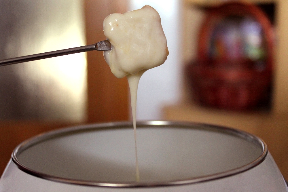 Relax Around a Melting Pot at a Fondue Restaurant